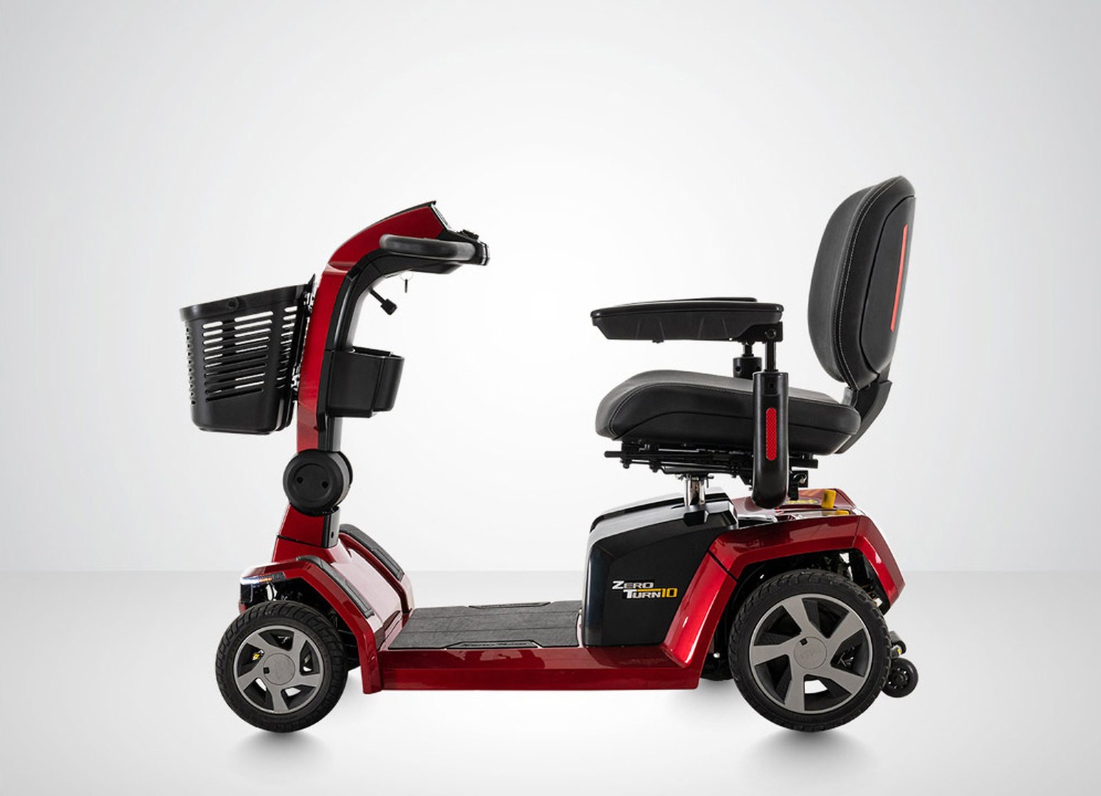 Pride Zero Turn 10 S710ZT Candy Apple Red mobility scooter full side view with adjustable seat and basket
